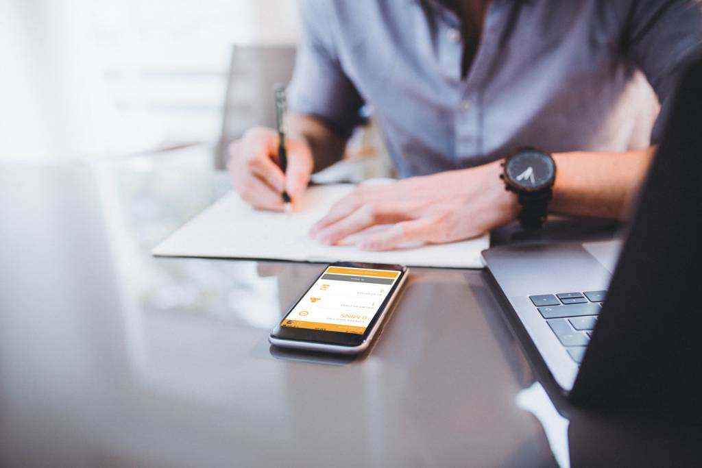 young-man-is-making-calculation-with-his-smartphone-and-a-notebook-1 compound prescriptions